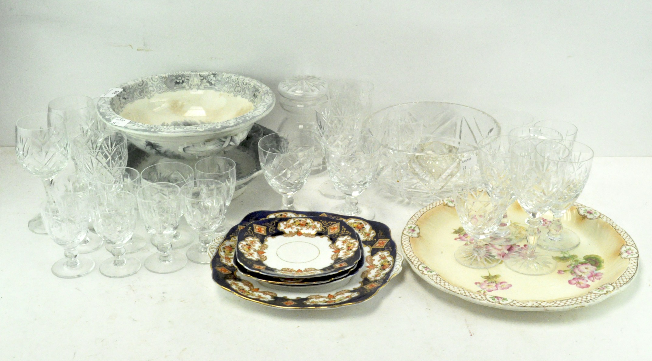 A collection of assorted glassware, including wine glasses,