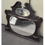 A large Victorian overmantle mahogany mirror, with three shelves,