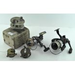 A group of five fishing reels, to include an Orlando minor reel,