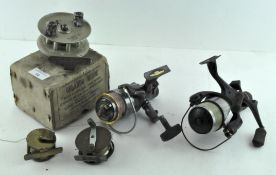 A group of five fishing reels, to include an Orlando minor reel,