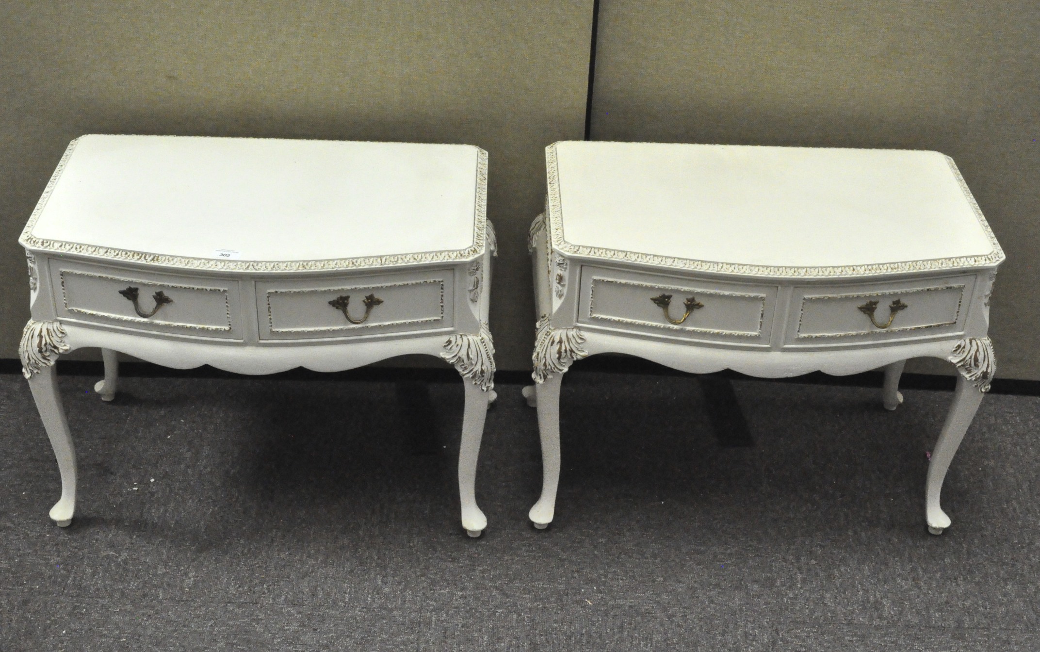 Two painted bedside cabinets with two drawers,