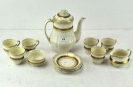 An Alfred Meakin 'Marigold' tea service, comprising a teapot, jug, sugar bowl and cups and saucers,
