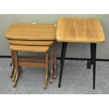 A retro nest of three tables on splayed legs, largest height 51cm,