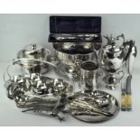 An extensive collection of silver plated wares including punch bowl, flatware,