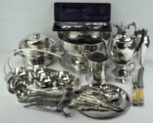 An extensive collection of silver plated wares including punch bowl, flatware,