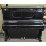 A J Becker upright piano, in black panelled case