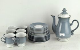 A Denby part coffee service for 6 people, comprising a coffee pot, cups and saucers and side plates,