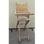 A vintage child's wooden high chair,