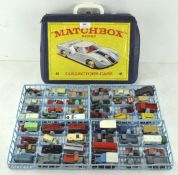 A collection of Matchbox diecast vehicles including cars, vans, tractors and more,