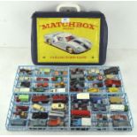 A collection of Matchbox diecast vehicles including cars, vans, tractors and more,