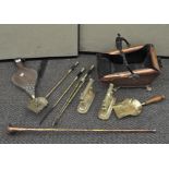 A collection of brass items, to include a 20th century copper coal scuttle,