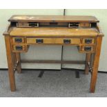 An Arts and Crafts style writing desk,