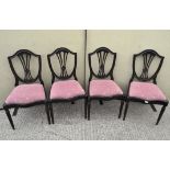 Four Sheraton style reproduction mahogany chairs with upholstered seats