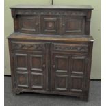 An oak court cupboard,