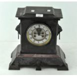 A slate mantel clock the dial inscribed Hry Marc Paris with exposed escapement