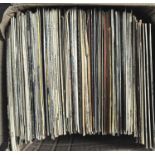 A box of records featuring a selection of 20th century music, including jazz, classical,