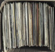 A box of records featuring a selection of 20th century music, including jazz, classical,