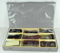 A large selection of sunglasses and spectacles, in assorted sizes and designs,