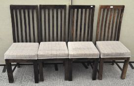 Four dining chairs in mango wood, upholstered seats,