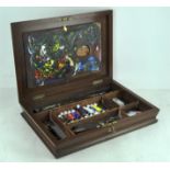 A mahogany artist's box, including a palette, brushes,