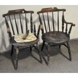 A Windsor style mahogany chair with circular seat and a spindle back,