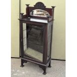 A late 19th/early 20th century mahogany display cabinet, glazed front and sides, with two shelves,