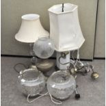 Three electric table lamps, one being ceramic,