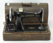 A Singer sewing machine decorated with motifs, reference number Y5618314,