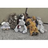A collection of nine teddy bears, including Charlie bears,