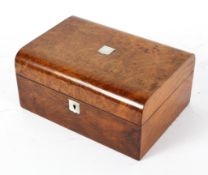 A Victorian walnut jewellery box, inlaid with a mother of pearl shield,