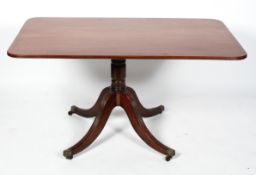 A 19th century mahogany and ebony line inlaid breakfast table,