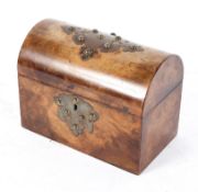 A Victorian walnut box, of domed form, with gilt metal mounts and vacant interior,