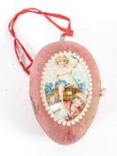 A bisque porcelain doll and four small painted wooden miniature figures,