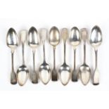 A collection of nine assorted silver tablespoons, including pieces hallmarked London and Exeter,