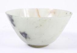 A Chinese pale celadon 'jade' bowl, of conical form with a narrow foot,