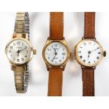 A collection of three wristwatches - Two Sekonda, one unbranded - within a wooden case.