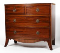 A 19th century mahogany bow fronted chest of two short and two long drawers on splayed bracket feet,