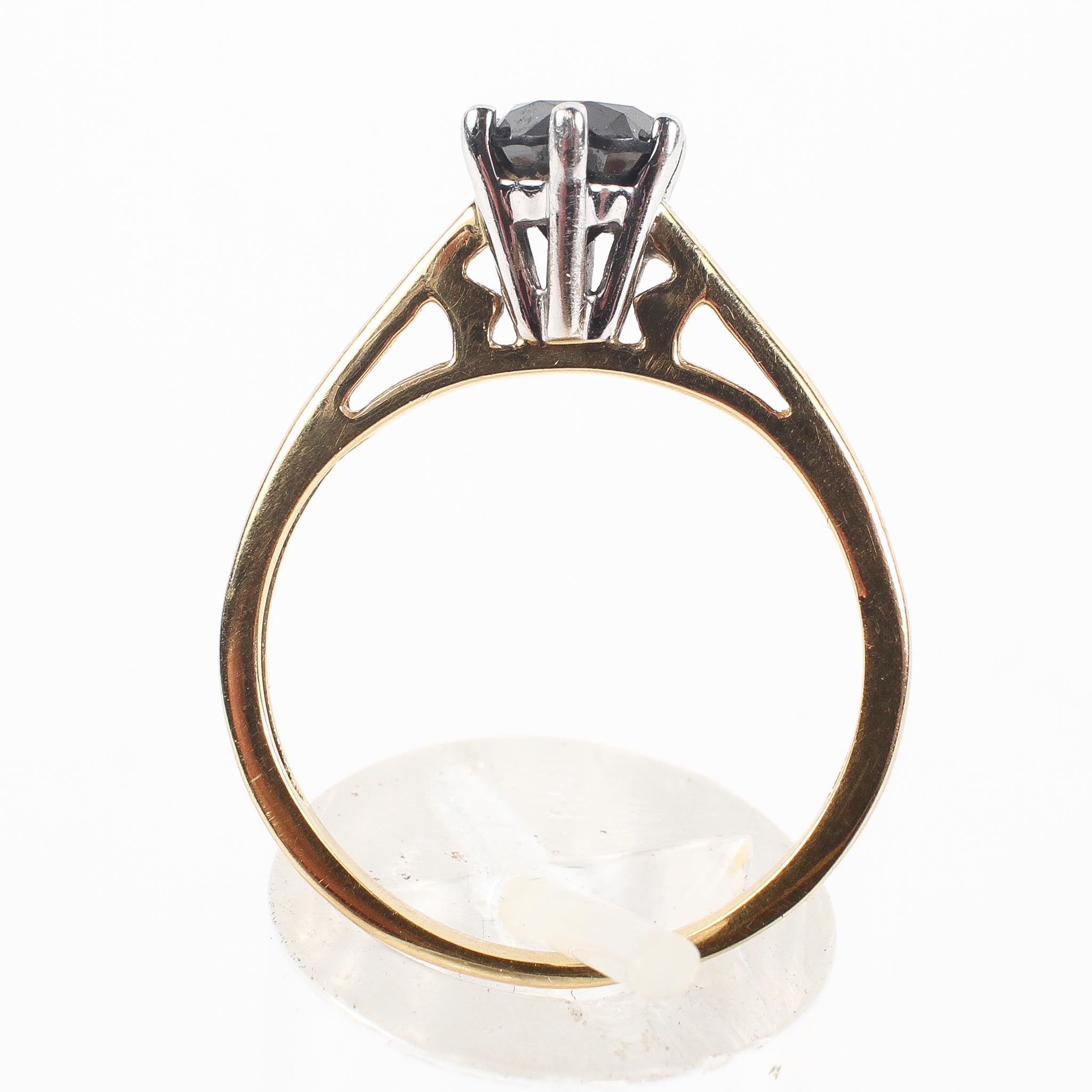 A yellow and white metal ring set with a round faceted cut black diamond estimated to weigh 1.14cts. - Image 3 of 3
