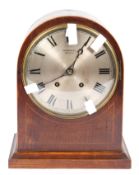 A Parsons Ltd (Bristol) bracket clock, with silvered dial and black Roman numerals,