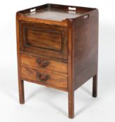 A Georgian mahogany tray top commode, with a single door above a commode drawer,