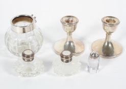 A small collection of silver items to include a pair of desk candlesticks,