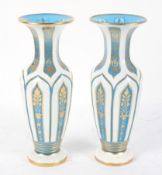 A pair of Bohemian style glass vases, of baluster form,