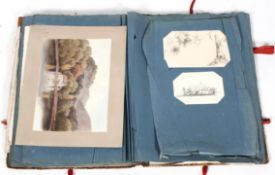 A Victorian scrapbook, with various prints, etchings,