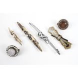 A collection of six abstract costume brooches of variable designs. Gross weight: 29.