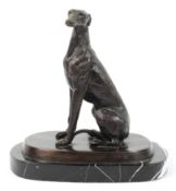 A 20th century school, Seated Greyhound on an oval black marble base,