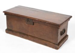 An oak chest, 18th century, of rectangular form, fitted with metal handles and lock,