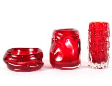 Three Whitefriars red glass vases, by Geoffrey Baxter and others, including a bark vase,
