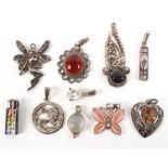 A collection of ten silver pendants of variable designs. Gross weight: 18.