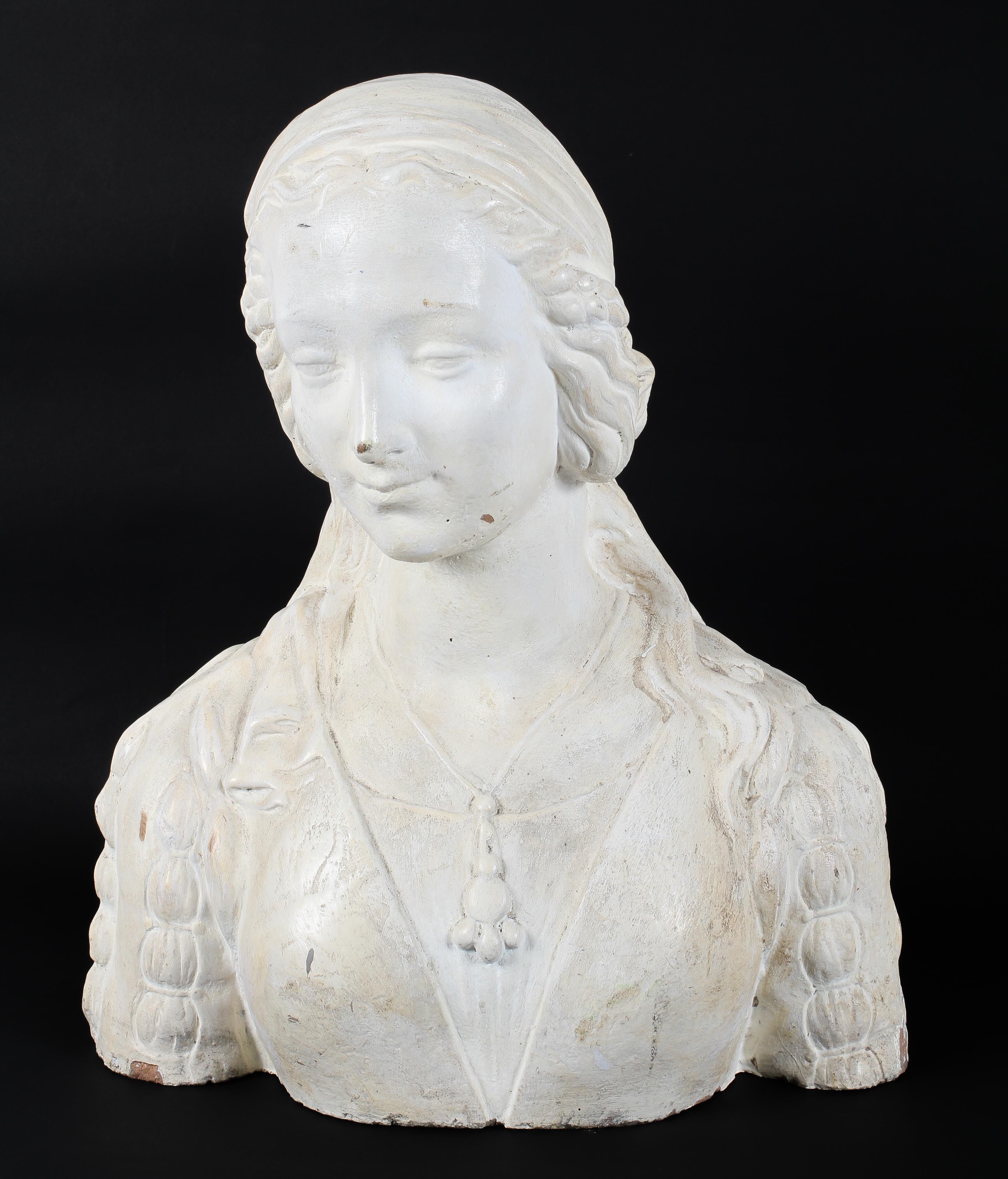 A white painted terracotta bust of a young lady, probably late 19th century,