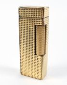 A Dunhill gilt metal pocket cigarette lighter,